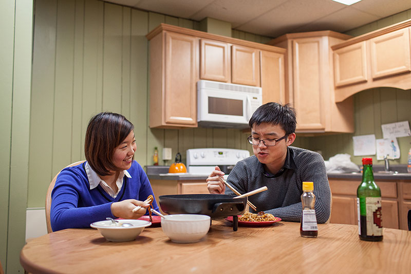 A couple eating dinner. A couple eating dinner.