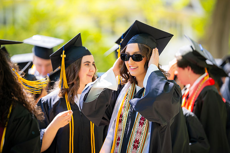 A student wearing sunglasses. Links to Donor-Advised Funds